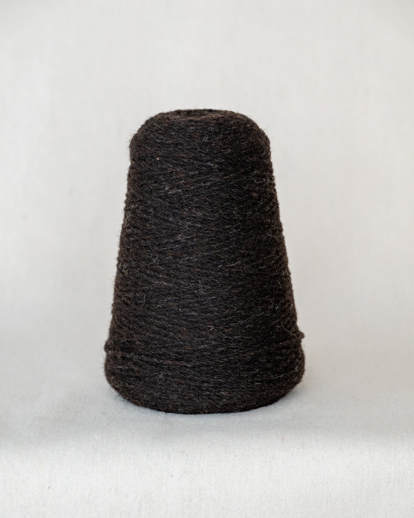 A cone of darn wool