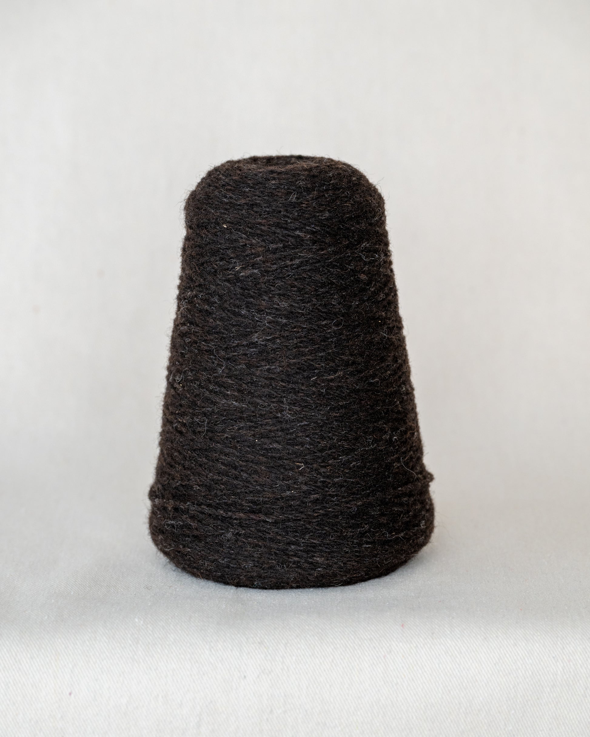 A cone of darn wool