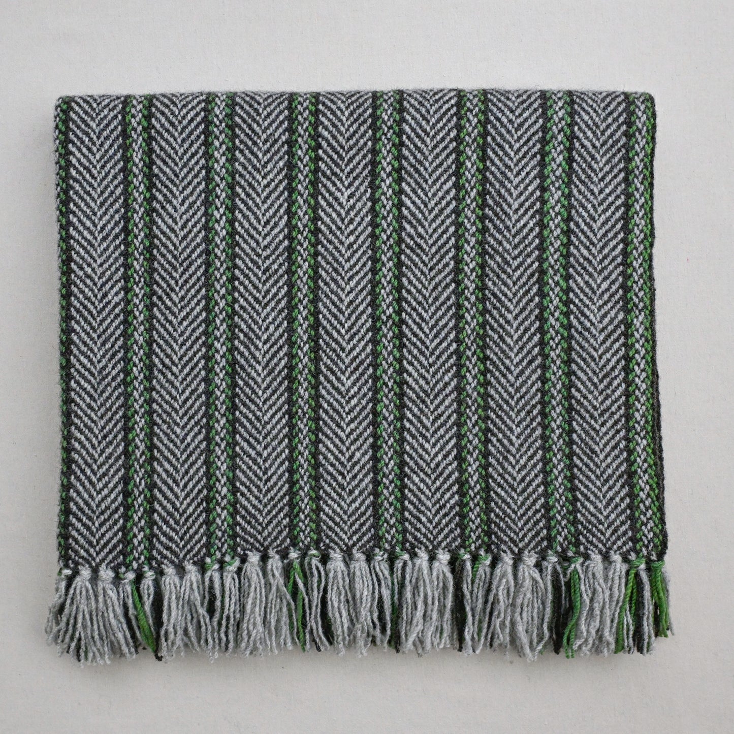 Handwoven in Edmonton, multi-tone wool blanket, herringbone weave, sustainable wool throw
