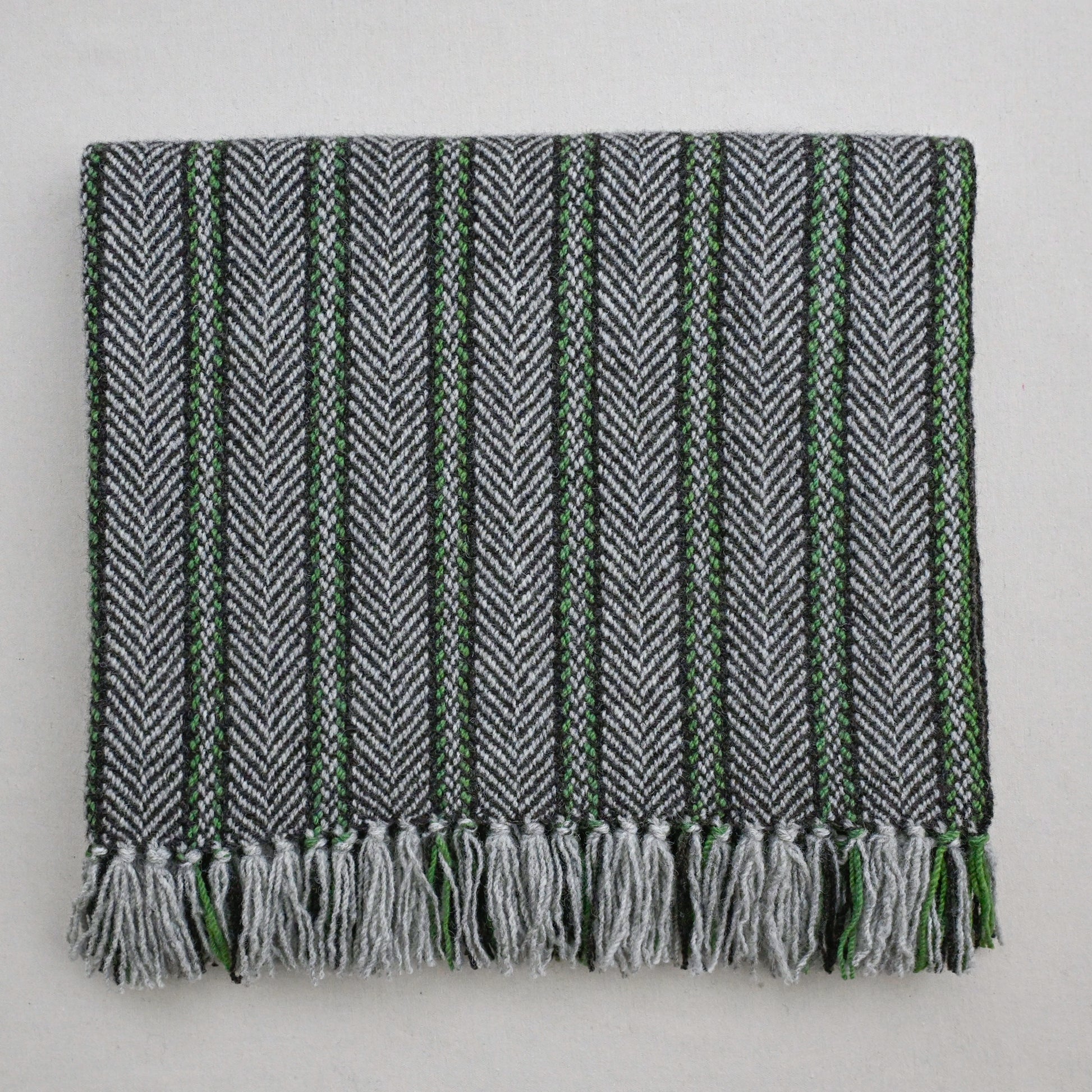 Handwoven in Edmonton, multi-tone wool blanket, herringbone weave, sustainable wool throw

