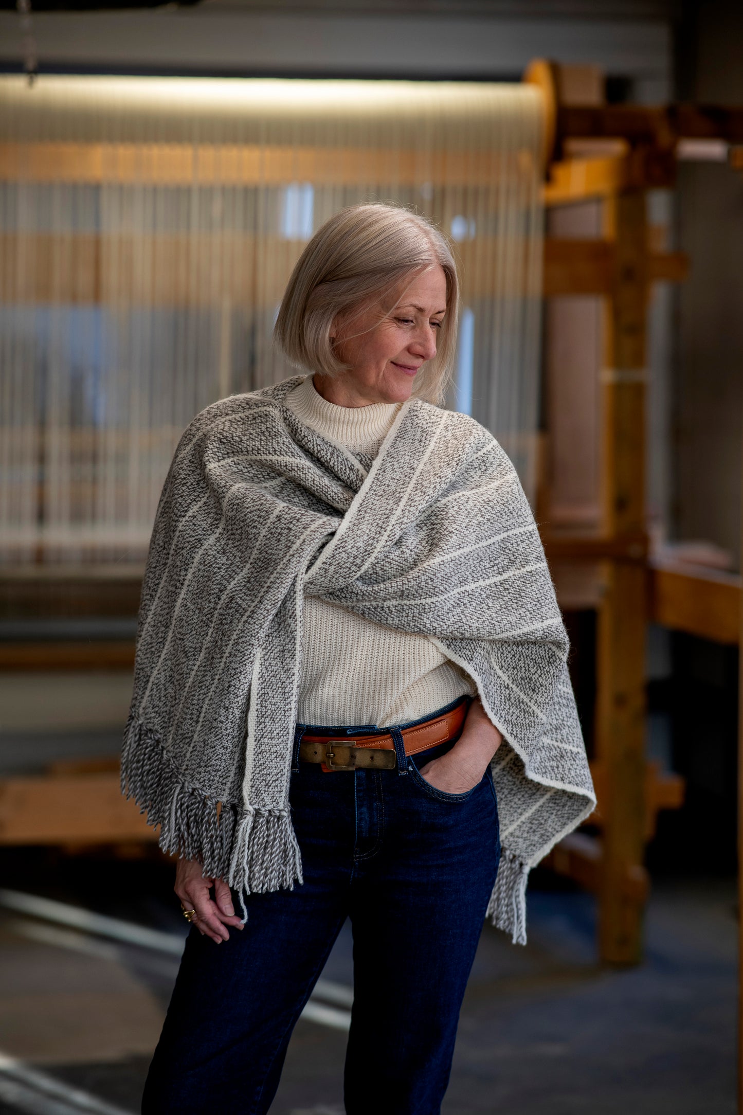 Woman wearing a 100% handwoven wool scarf
