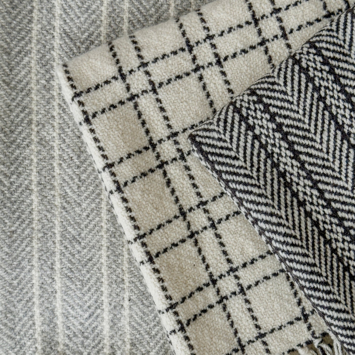 A classic herringbone pattern, these rich, earthy blanket brings timeless warmth and texture to any home or cabin.